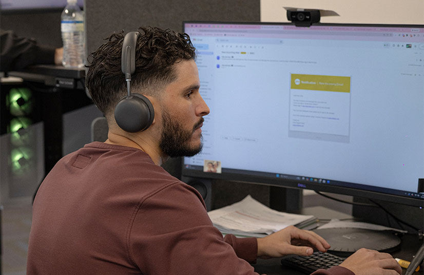 Oscar working at a computer
